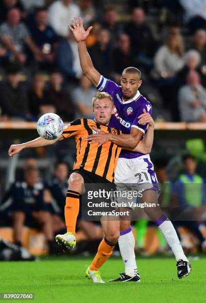 Hull Citys Seb Larsson is fouled by Bolton Wanderers' Darren Pratley during the Sky Bet Championship match between Hull City and Bolton Wanderers at...