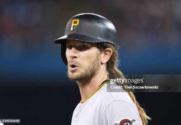 John Jaso of the Pittsburgh Pirates looks on from first base in the third inning during MLB game action against the Toronto Blue Jays at Rogers...