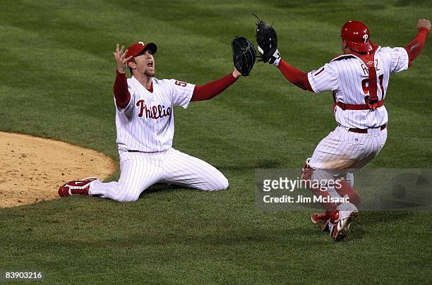 Brad Lidge and Carlos Ruiz of the Philadelphia Phillies celebrate the final out of their 4-3 win to win the World Series against the Tampa Bay Rays...