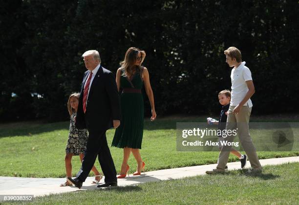 President Donald Trump walks with first lady Melania Trump , son Barron , granddaughter Arabella Rose Kushner and grandson Joseph Frederick Kushner...