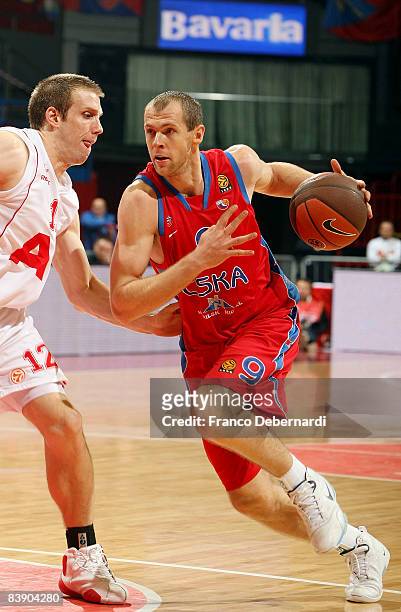 Ramunas Siskauskas, #9 of CSKA Moscow competes with Richard Mason Rocca, #12 of AJ Milano during the Euroleague Basketball Game 6 match between...
