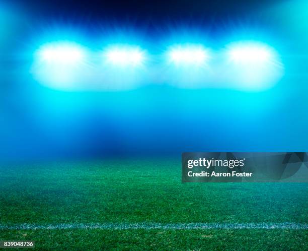 night stadium grass - reflector fotografías e imágenes de stock