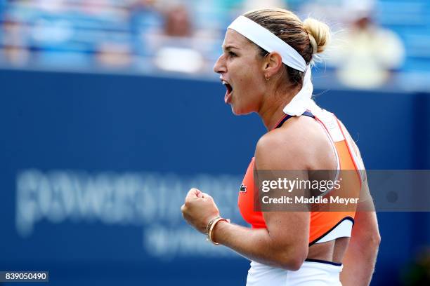 Dominika Cibulkova of Slovakia celebrates after defeating Elise Mertens of Belgium during Day 7 of the Connecticut Open at Connecticut Tennis Center...