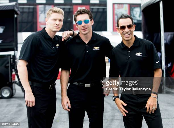 Team Penske drivers Josef Newgarden, Simon Pagenaud, and Helio Castroneves are photographed for Sports Illustrated on August 18, 2017 at Pocono...