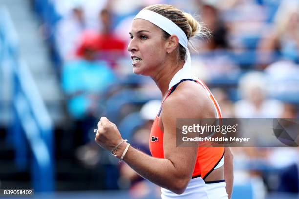Dominika Cibulkova of Slovakia celebrates after defeating Elise Mertens of Belgium during Day 7 of the Connecticut Open at Connecticut Tennis Center...