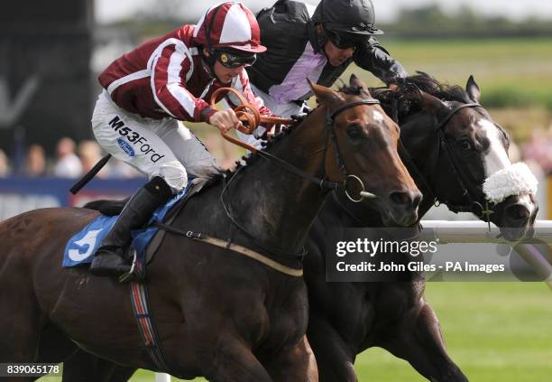 Paul Hanagan on Blown It wins the Book Now for Saturday Handicap at Catterick Racecourse, North Yorkshire.