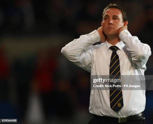 Cardiff City Manager Malky Mackay shows his dejection during the npower Championship match at Cardiff City Stadium, Cardiff.