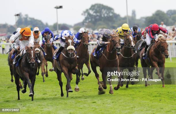 Navajo Chief ridden by Harry Bentley win the Addleshaw Goddard Stakes during the Ebor Festival 2011 at York Racecourse.