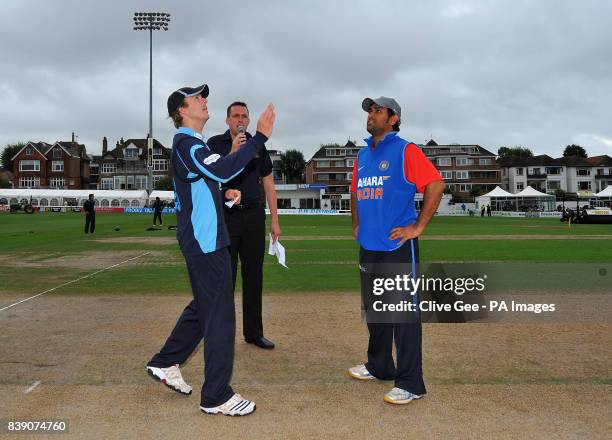 Sussex captain Chris Nash and Indian captain MS Dhoni toss the coin during the Tour Match at the PROBIZ County Ground, Hove.