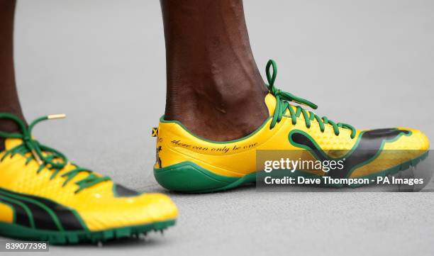 The running spikes of Jamaica's Usain Bolt with the phrase "There can only be one" written on, before he competes in the men's 200 metres heats...