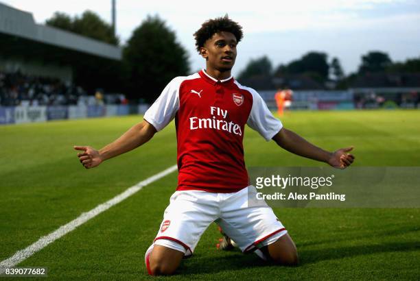 Reiss Nelson of Arsenal celebrates after scoring his sides first goal during the Premier League 2 match between Arsenal and Liverpool at Meadow Park...