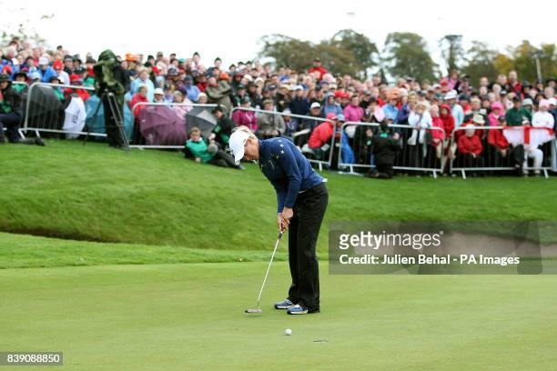 Europe's Suzann Pettersengoes on to win her singles match against USA's Michelle Wie during day three of the 2011 Solheim Cup at Killeen Castle,...