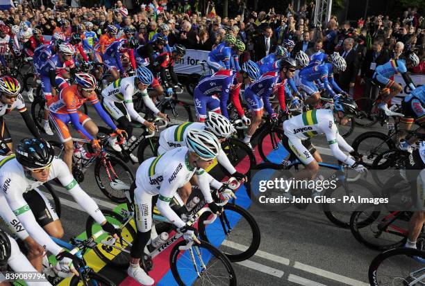 Riders in the Men's Elite Road Race with the Great Britain team and leader Mark Cavendish leave Copenhagen City centre at the start during Day Seven...