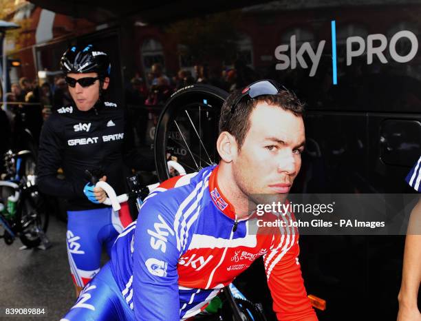 Mark Cavendish leaves the Sky Team bus wearing his Great Britain team jersey as he arrives at the start for the Men's Elite Race during Day Seven of...