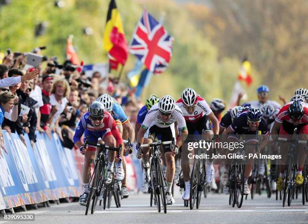 Great Britain's Mark Cavendish crosses the line to win the Men's Road Race during Day Seven of the UCI Road Race World Championships, Copenhagen.