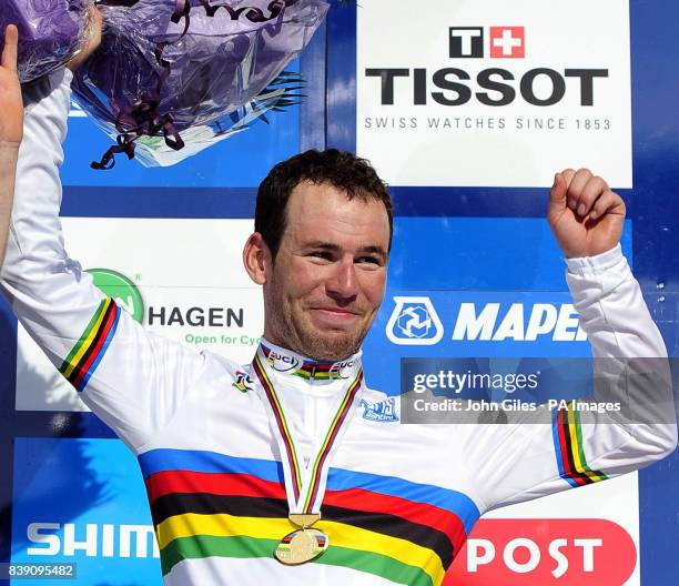 Great Britain's Mark Cavendish wears his rainbow jersey as he celebrates winning the Men's Road Race during Day Seven of the UCI Road Race World...