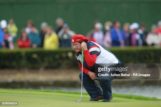 S Christina Kim lines up a putt during day three of the 2011 Solheim Cup at Killeen Castle, County Meath, Ireland.