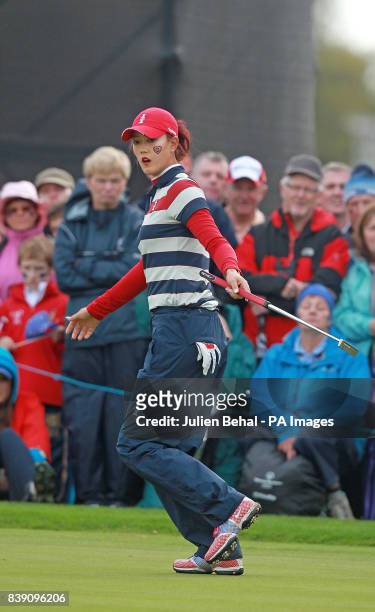 S Michelle Wie reacts after missing a putt during day three of the 2011 Solheim Cup at Killeen Castle, County Meath, Ireland.