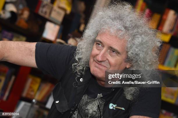 Lead guitarist of Queen Brian May signs copies of his new book "Queen in 3-D" at Book Soup on August 24, 2017 in West Hollywood, California.