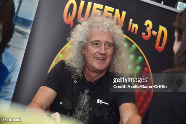 Lead guitarist of Queen Brian May signs copies of his new book "Queen in 3-D" at Book Soup on August 24, 2017 in West Hollywood, California.