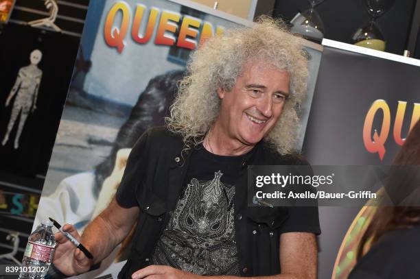 Lead guitarist of Queen Brian May signs copies of his new book "Queen in 3-D" at Book Soup on August 24, 2017 in West Hollywood, California.