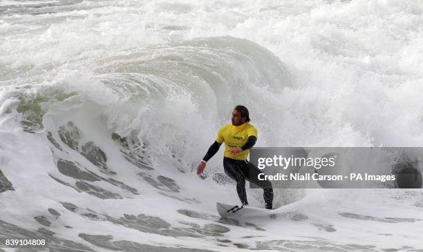 France's Valero Adrien takes part in the mens final of the Open Surf category the European Surfing Championships being held in Bundoran in County...