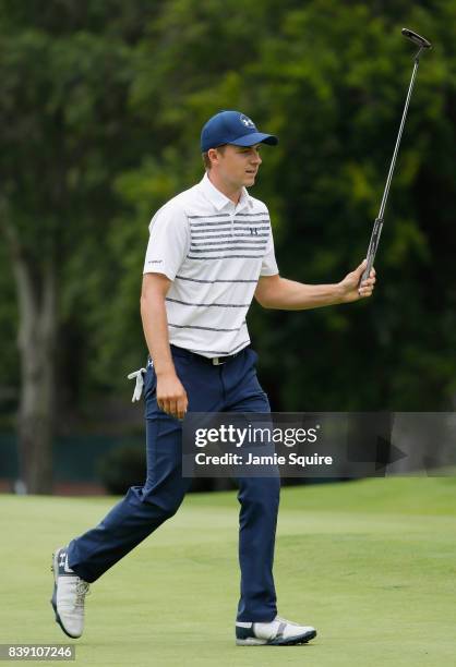 Jordan Spieth of the United States reacts after putting for birdie on the 16th green during round two of The Northern Trust at Glen Oaks Club on...