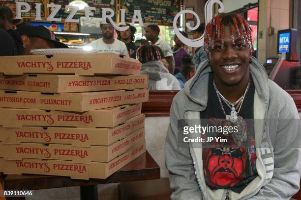Rapper Lil Yachty and Bravado launch Yachty's Pizzeria, a pop-up pizzeria at Famous Ben's Pizzeria located on 177 Spring Street on August 25, 2017 in...
