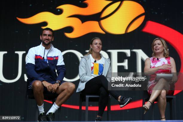 Marin Cilic , Angelique Kerber and Chris McKendry attend the US Open Draw Ceremony at the Seaport District during US Open Fan Week in Manhattan, New...