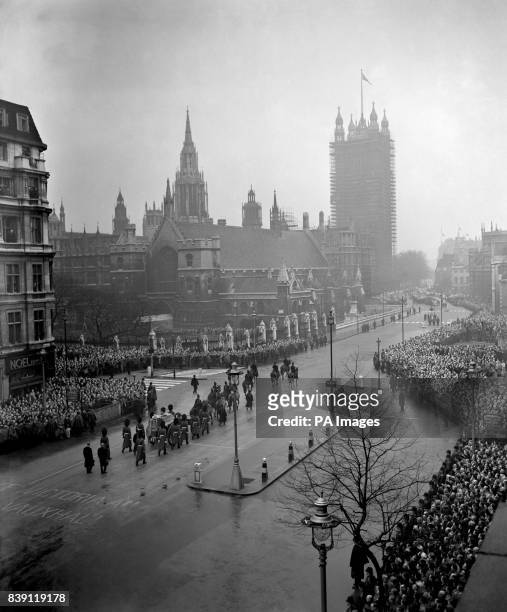 The cortege with the coffin of King George VI, about to enter New Palace Yard from Parliament Square, as it arrived at Westminster Hall to lie in...