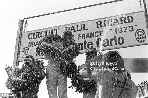 Ronnie Peterson, Carlos Reutemann, François Cevert, Grand Prix of France, Paul Ricard, 01 July 1973. Champagne shower for Ronnie Peterson's first...