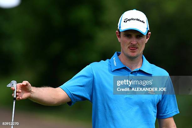 Justin Rose of England lines up a shot on the 14th hole on Day one of the South African Golf Nedbank Golf Challenge in Sun City, on December 04,...