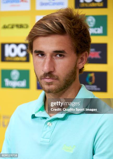 Sergi Samper of Las Palmas faces the media during his presentation as a new player for UD Las Palmas at Estadio Gran Canaria on August 25, 2017 in...