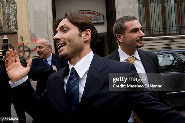 Piersilvio Berlusconi , son of PM Silvio Berlusconi and President of Mediaset, talks outside the ARCI , which is politically alligned to the left...