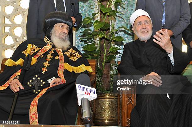 Pope Shenouda III sits with the Grand Mufti of Cairo�s al-Azhar Mosque, Sheikh Mohammed Sayyed Tantawi , during a visit by the Coptic Christian pope...