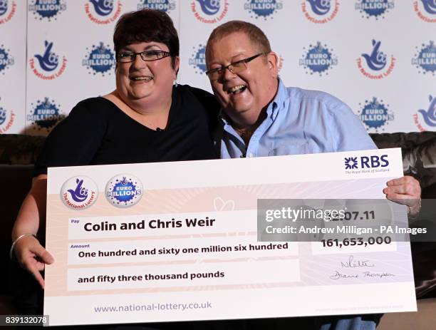 Colin and Chris Weir, from Largs in Ayrshire, pose for photographs during a press conference at the Macdonald Inchyra Hotel & Spa in Falkirk, after...