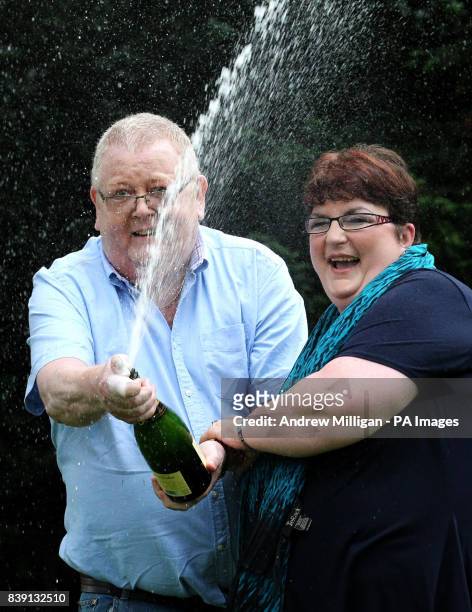 Colin and Chris Weir, from Largs in Ayrshire, celebrate during a photo call at the Macdonald Inchyra Hotel & Spa in Falkirk, after they scooped 161...