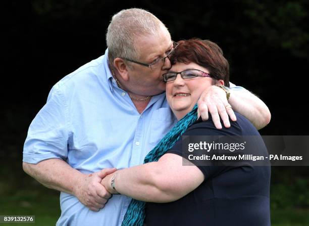 Colin and Chris Weir, from Largs in Ayrshire, kiss during a photo call at the Macdonald Inchyra Hotel & Spa in Falkirk, after they scooped 161...