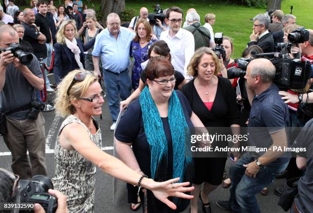 Colin and Chris Weir, from Largs in Ayrshire, make their way through waiting media at the Macdonald Inchyra Hotel & Spa in Falkirk, after they...