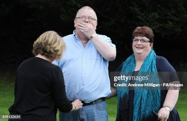 Colin Weir has his shirt tucked in during a photo call with his wife Chris at the Macdonald Inchyra Hotel & Spa in Falkirk, after they scooped 161...