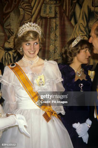 The Princess of Wales at a banquet for the British royal family given by Queen Beatrix and Prince Claus of the Netherlands at Hampton Court Palace....