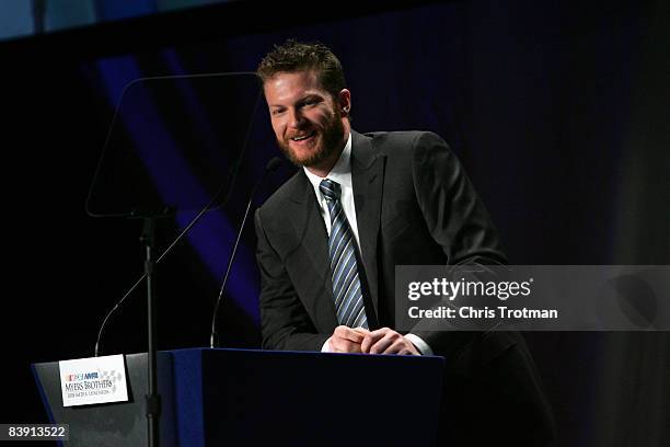 Dale Earnhardt Jr., driver of the AMP Energy/National Guard Chevrolet, receives the Chex Most Popular Driver award during NASCAR Champions Week NMPA...