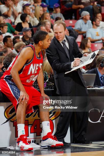 Devin Harris of the New Jersey Nets listens to his Head Coach Lawrence Frank during the game against the Sacramento Kings on November 26, 2008 at...
