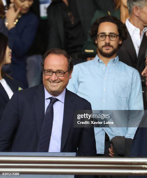French former president Francois Hollande and his son Thomas Hollande attend the French Ligue 1 match between Paris Saint Germain and AS...