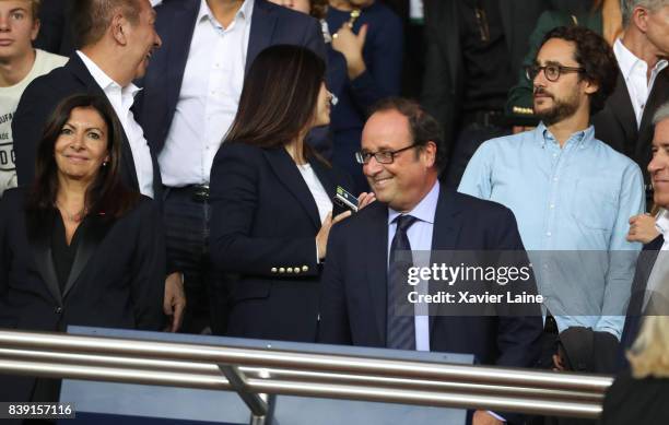 Mayor of Paris Anne Hidalgo, French former president Francois Hollande and his son Thomas Hollande attend the French Ligue 1 match between Paris...