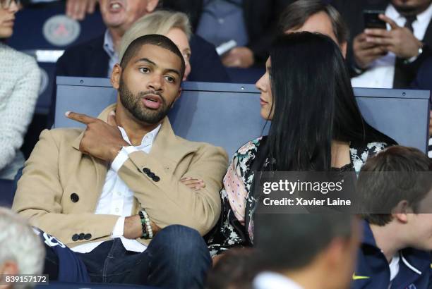 Nicolas Batum and his wife Aurelie attend the French Ligue 1 match between Paris Saint Germain and AS Saint-Etienne at Parc des Princes on August 25,...