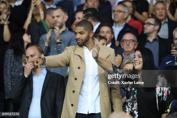 Nicolas Batum and his wife Aurelie attend the French Ligue 1 match between Paris Saint Germain and AS Saint-Etienne at Parc des Princes on August 25,...