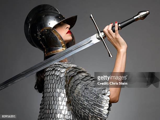woman knight with sword - schwert stock-fotos und bilder