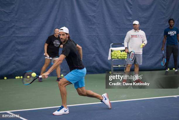 Feliciano Lopez surprises and join unsuspecting fans for A few games on court fans at Arthur Ashe Stadium on August 25, 2017 in New York City.