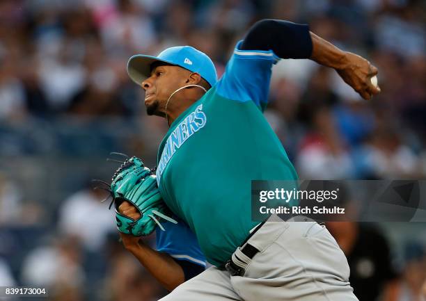 Pitcher Ariel Miranda of the Seattle Mariners delivers a pitch against the New York Yankees during the first inning of a game at Yankee Stadium on...